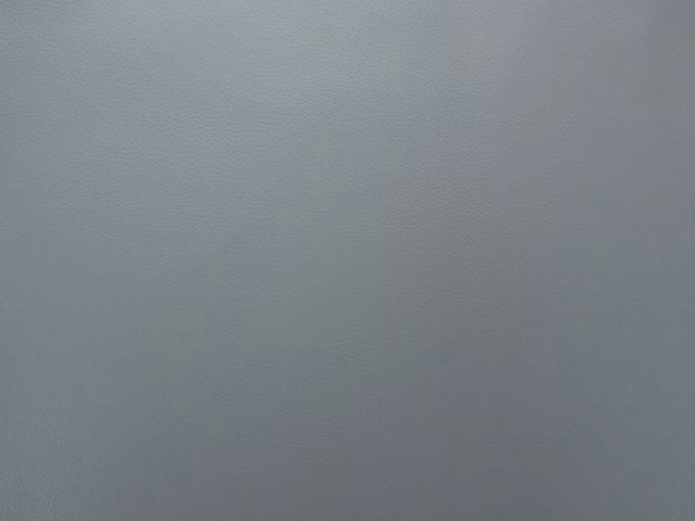 Muted blue-grey faux leather with a subtle fine-grained surface