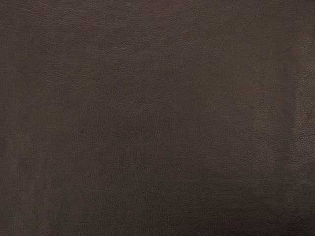 Dark brown faux leather with a subtle pebbled grain and soft tonal shading