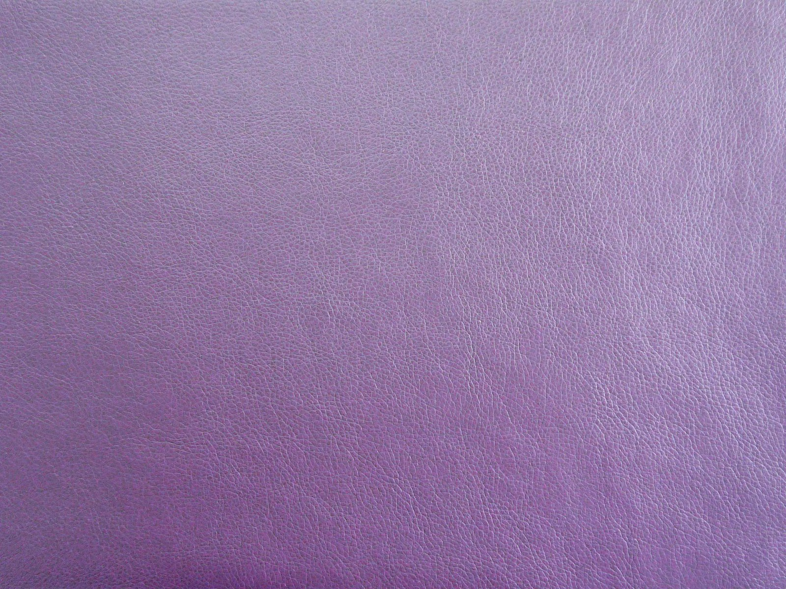 Dusty lilac purple faux leather with a fine pebbled grain and subtle tonal sheen