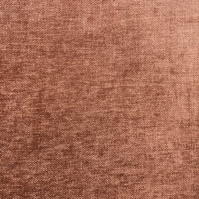Muted terracotta-brown chenille close-up with fine weave and softly mottled tonal shading
