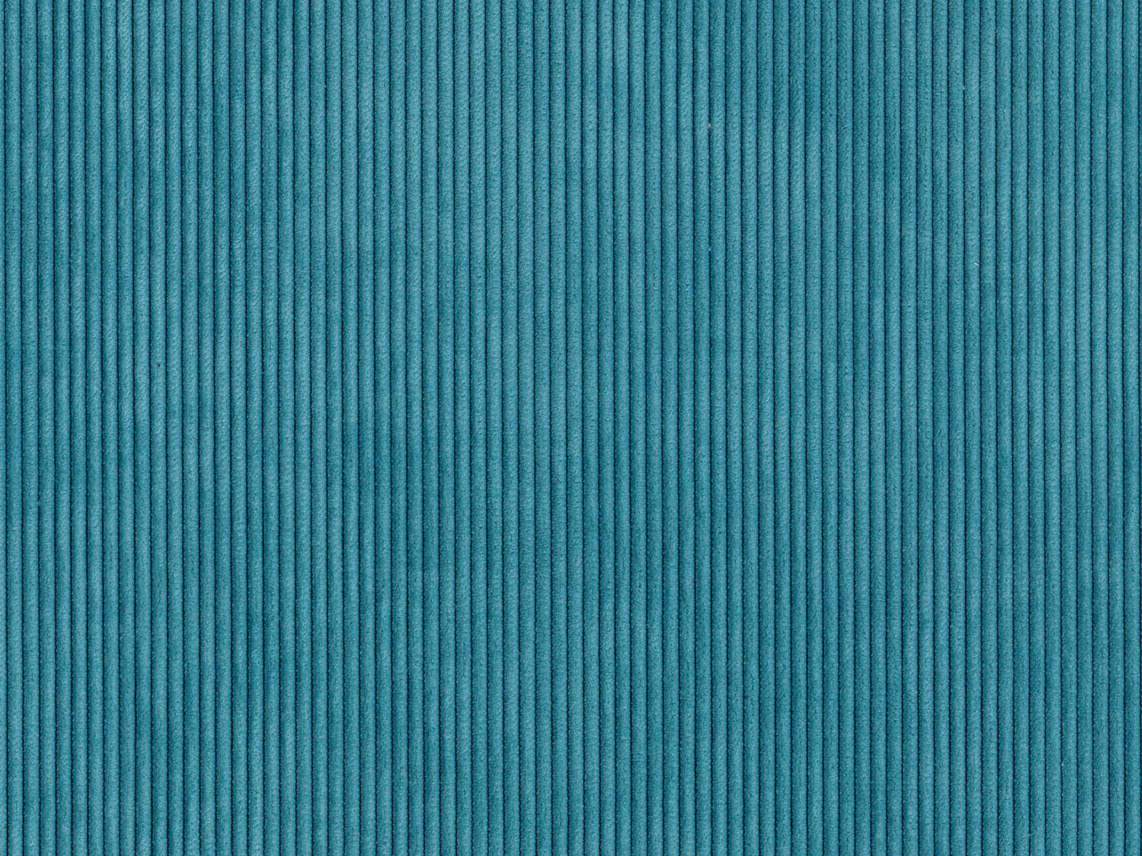 Close-up of turquoise teal fabric with fine, closely spaced vertical ribs