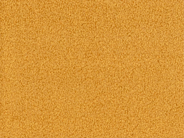Warm ochre-gold fabric with a finely pebbled, nubby woven surface