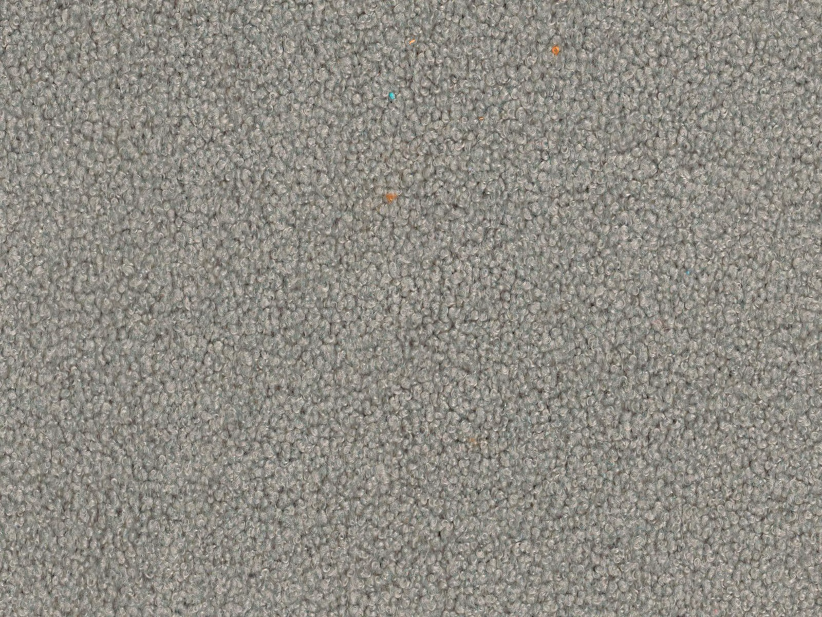 Mottled stone-grey fabric with dense looped texture and subtle taupe flecks