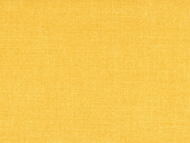 Warm golden-yellow flat weave with a fine, softly crosshatched surface