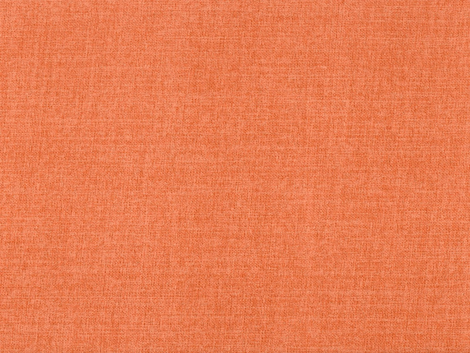 Warm coral-terracotta flat weave showing a fine crosshatched woven texture