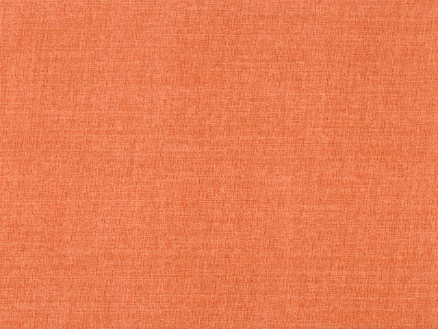 Warm coral-terracotta flat weave showing a fine crosshatched woven texture