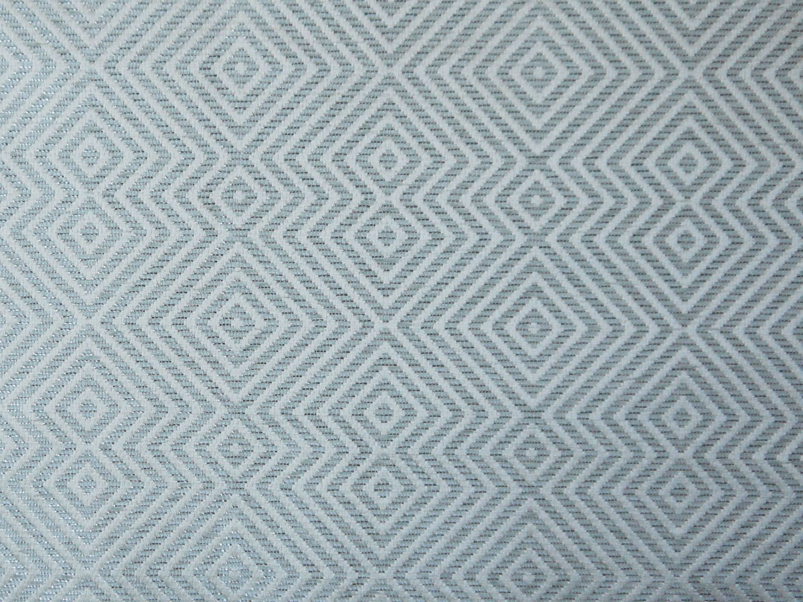 Pale blue-grey chenille with repeated stepped diamond motifs and textured weave
