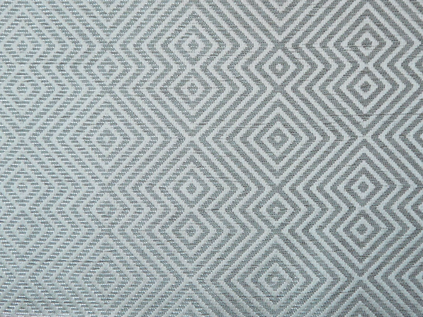 Cool blue-grey chenille with repeating diamond and chevron weave texture