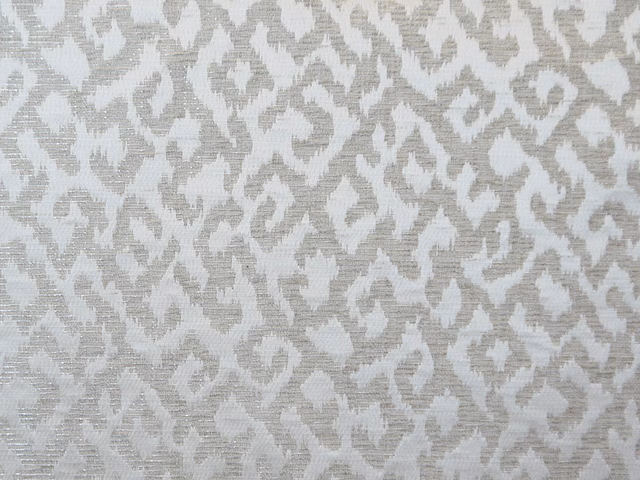 Pale greige chenille with a broken taupe-grey abstract woven motif