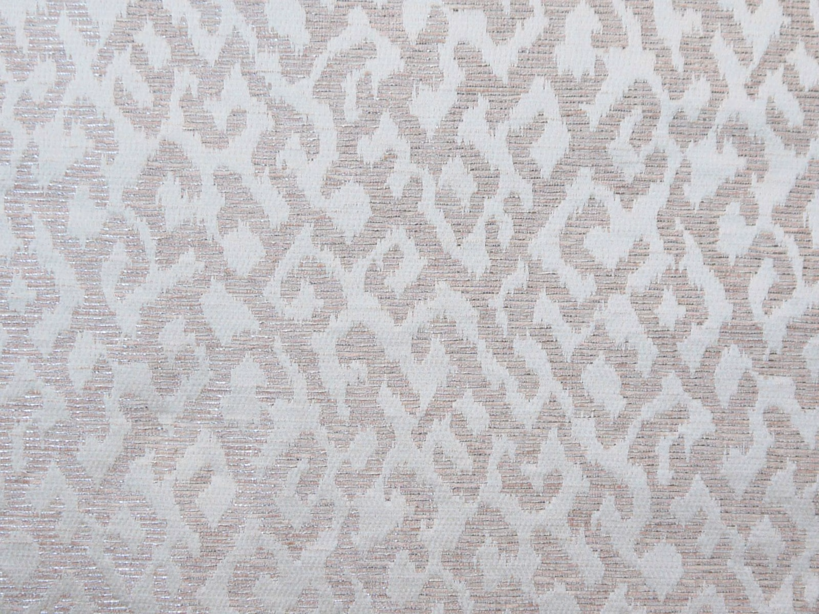 Ivory chenille with irregular pale taupe abstract motifs and a fine woven texture