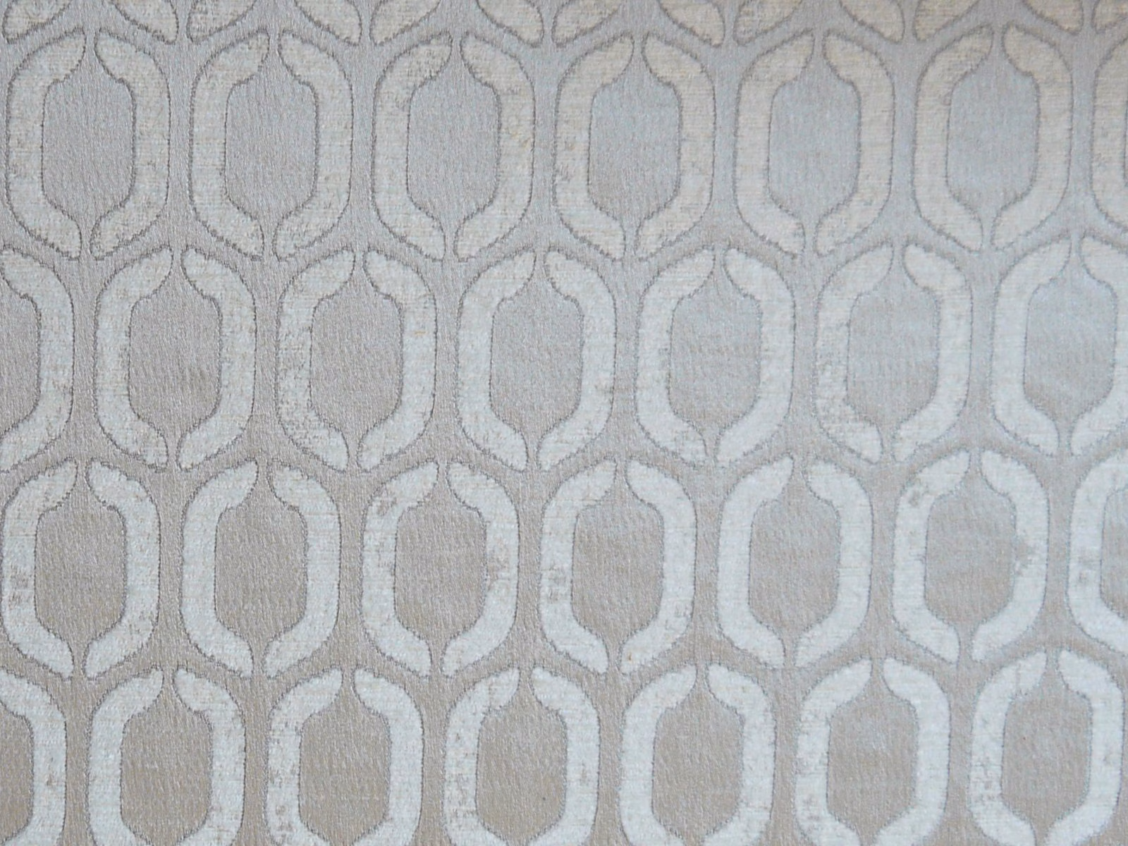Pale dove-grey chenille with a repeating light geometric oval lattice motif