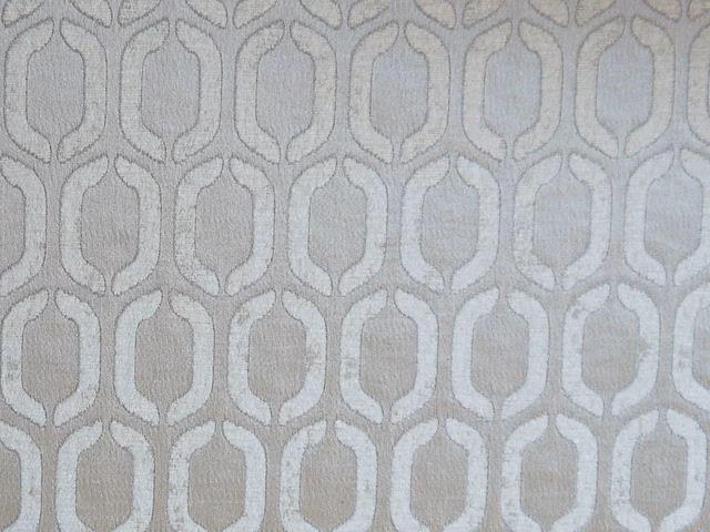 Pale dove-grey chenille with a repeating light geometric oval lattice motif
