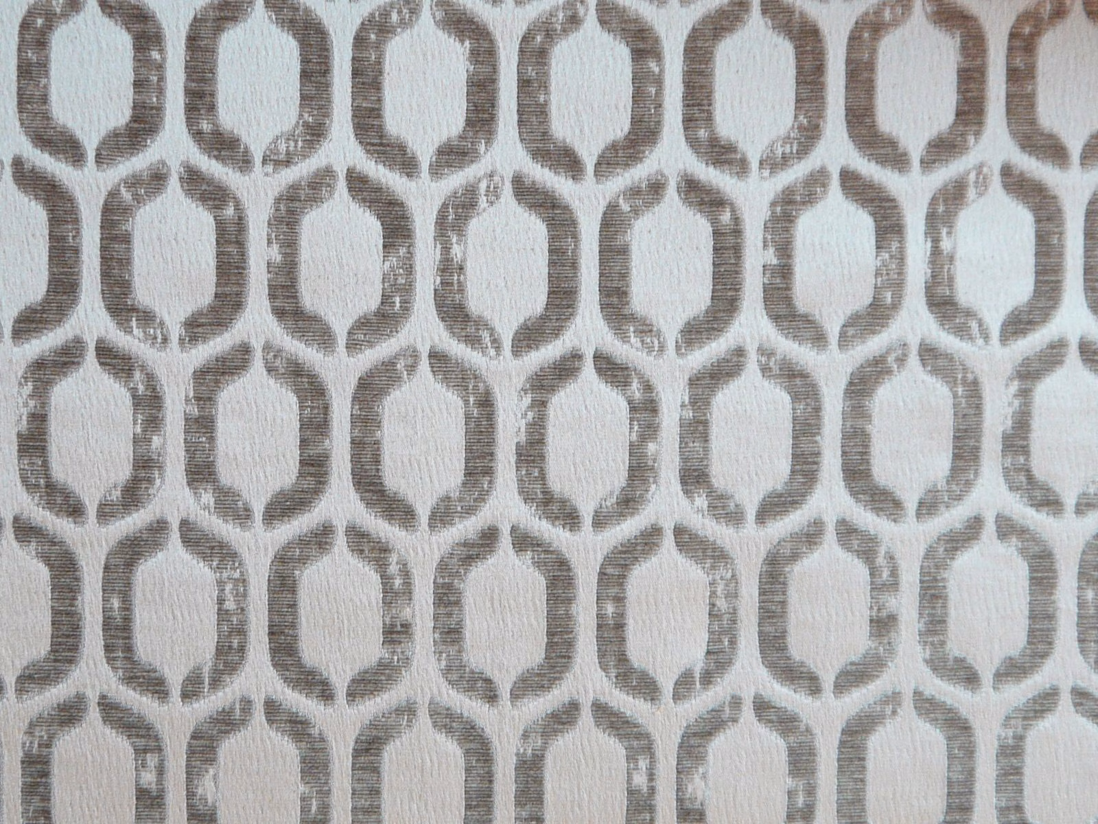 Blue-grey chenille with taupe interlocking loop motifs and a softly heathered surface