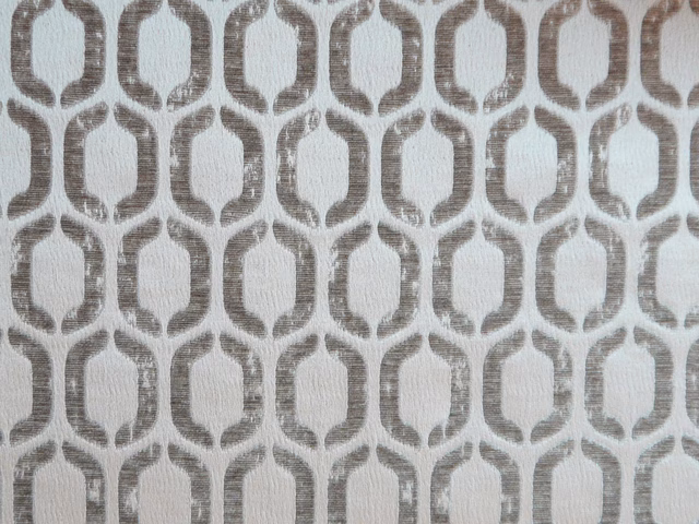 Blue-grey chenille with taupe interlocking loop motifs and a softly heathered surface