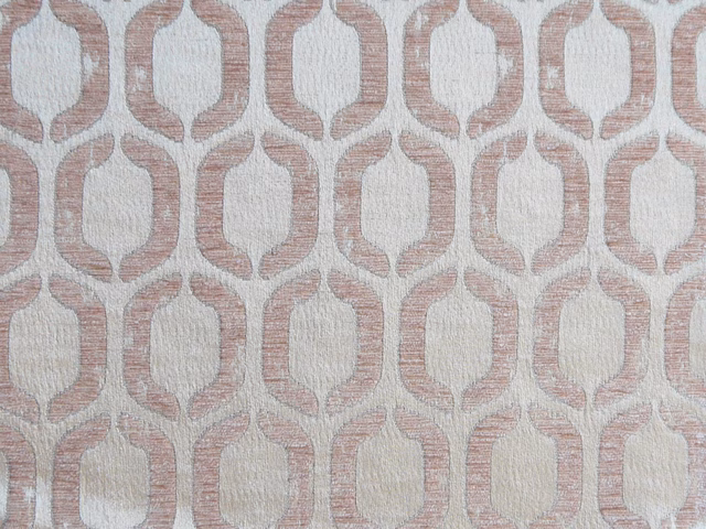 Dusty blush pink chenille with ivory linked geometric motifs and a softly ridged weave