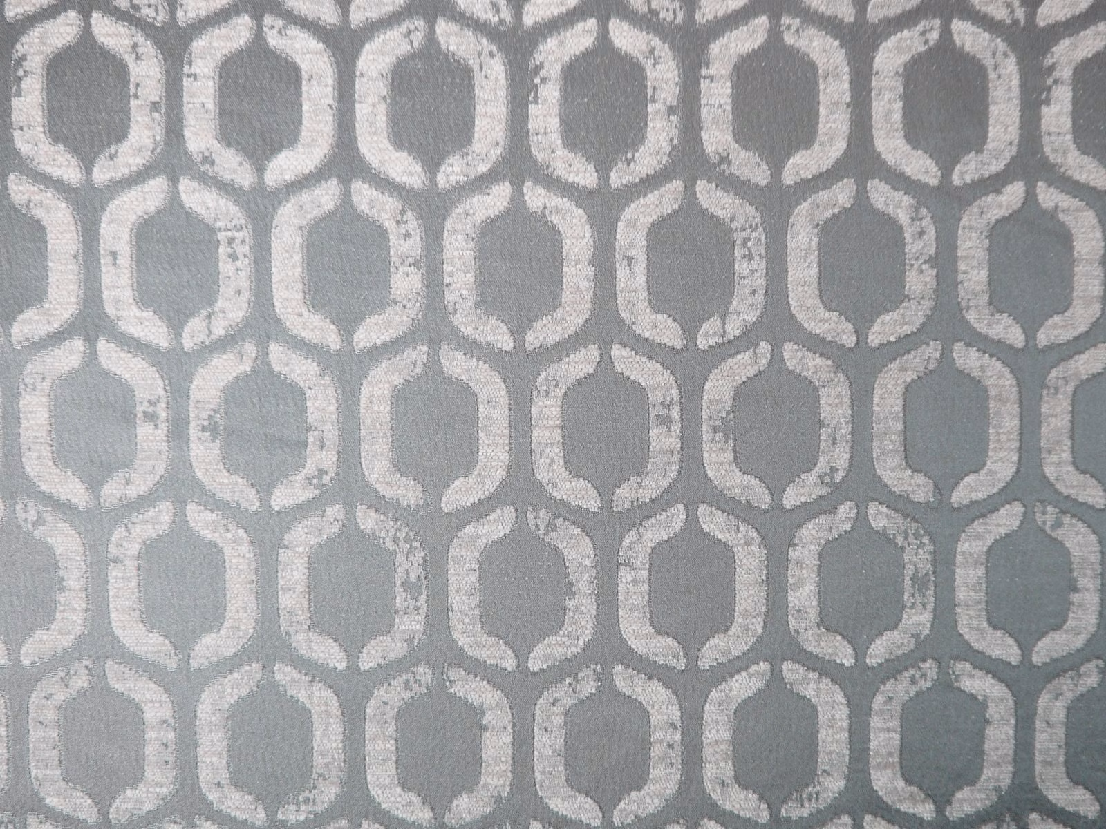 Cool silver-grey chenille with pale interlocking rounded lattice and softly textured pile