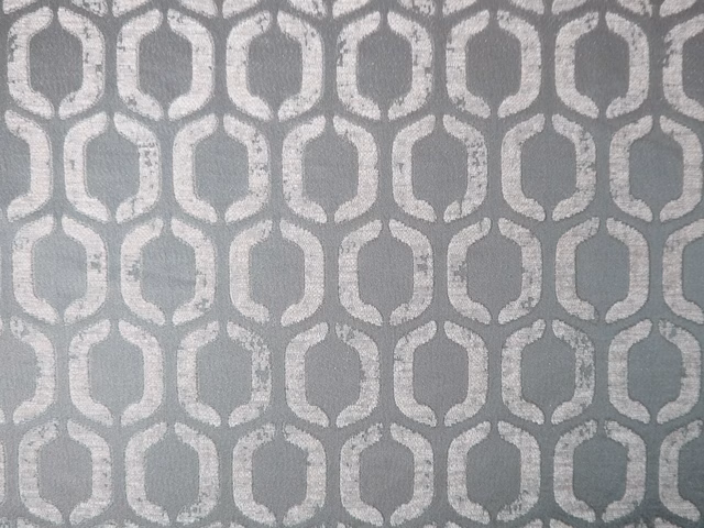 Cool silver-grey chenille with pale interlocking rounded lattice and softly textured pile