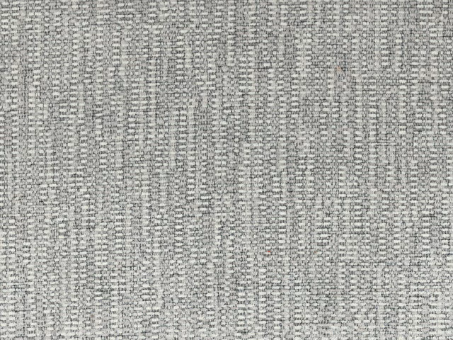 Cool stone-grey chenille with dark flecks and softly striated woven texture