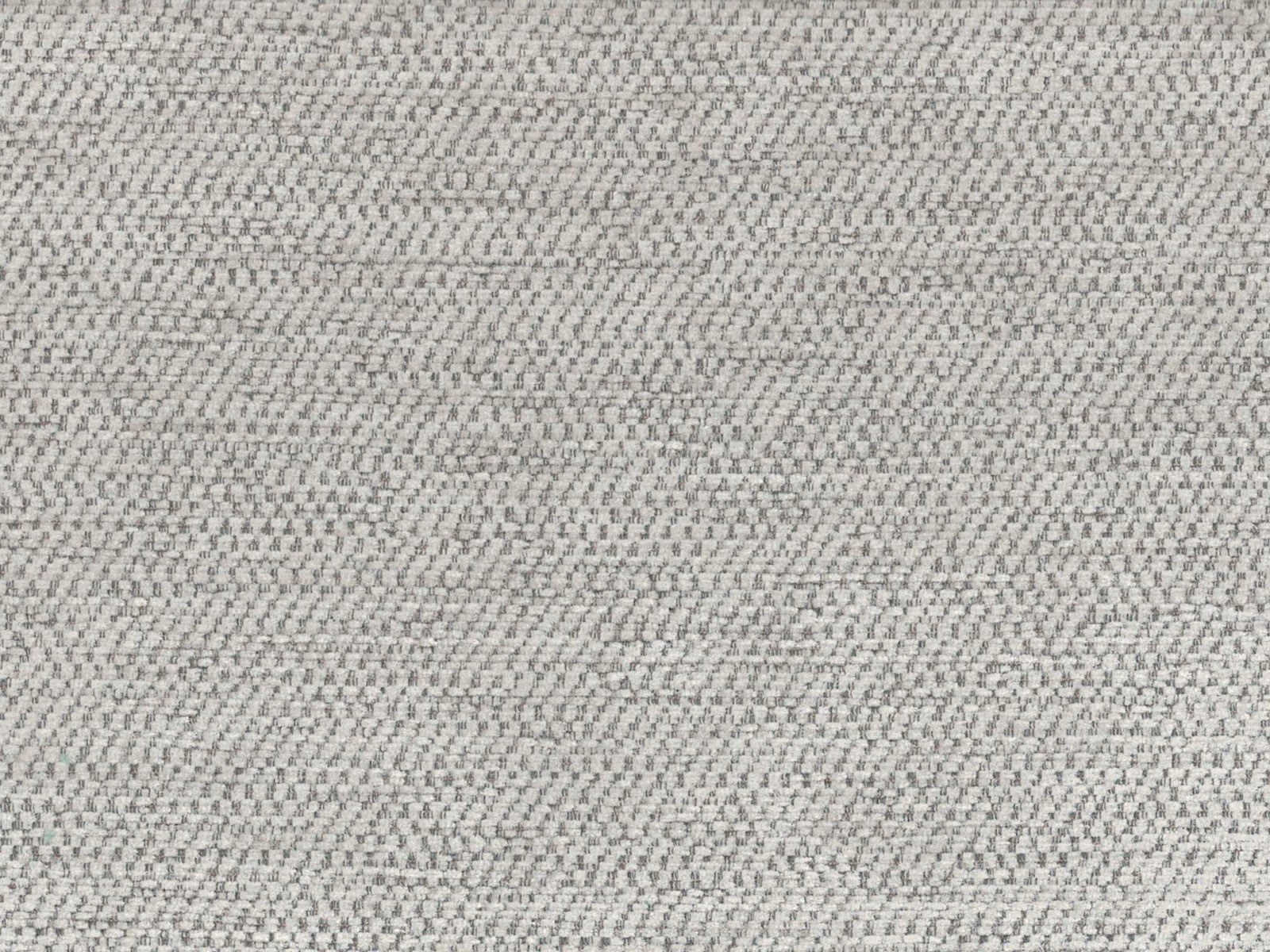 Close-up of softly mottled pale grey chenille with a fine woven texture