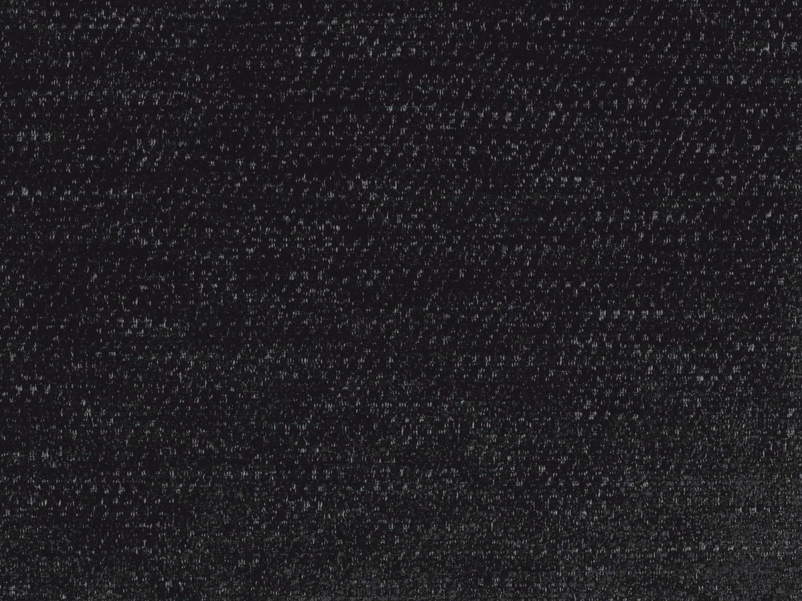 Near-black charcoal chenille with fine pale flecks and a softly mottled weave.