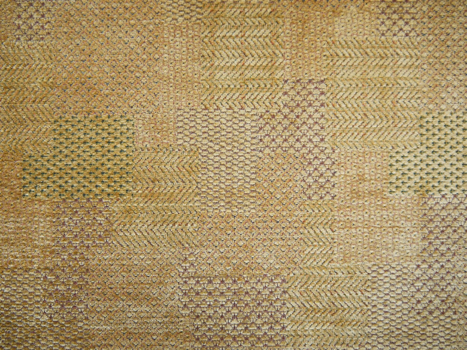 Warm ochre chenille with sand, olive and muted lilac geometric woven patches