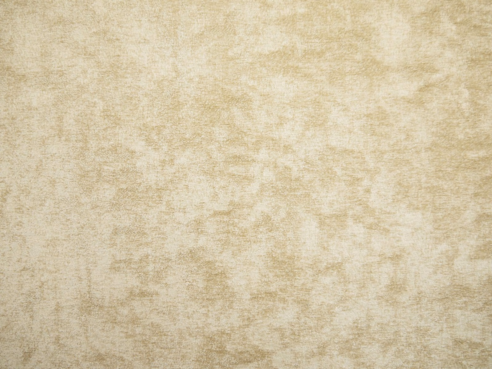 Warm parchment-beige chenille with cloudy ivory and taupe mottling across the surface