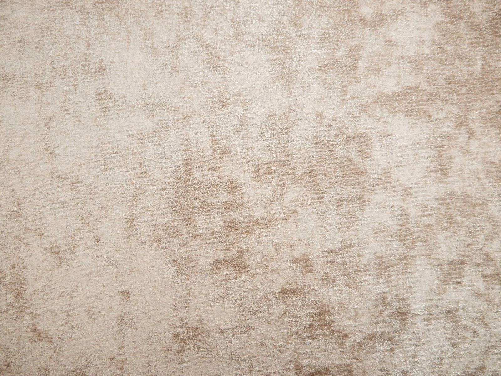 Warm ivory-beige chenille with softly brushed taupe mottling and weathered texture