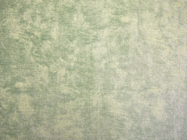 Pale sage green chenille with cloudy mottling and a fine horizontal woven texture