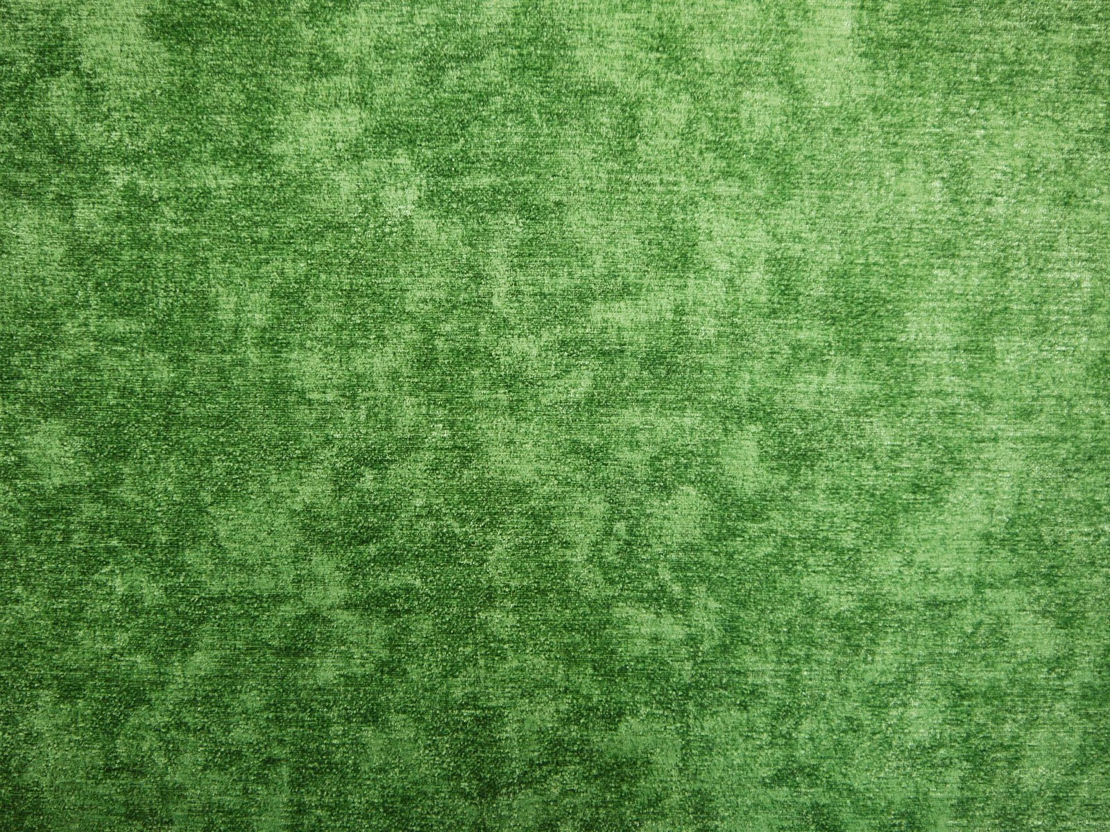 Mottled emerald-green chenille with cloudy tonal variation and softly brushed texture