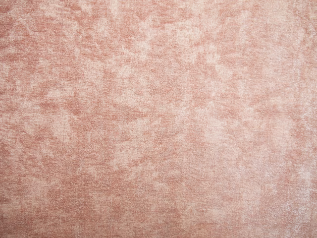 Dusty rose pink chenille with pale blush, ivory clouding and a softly mottled surface