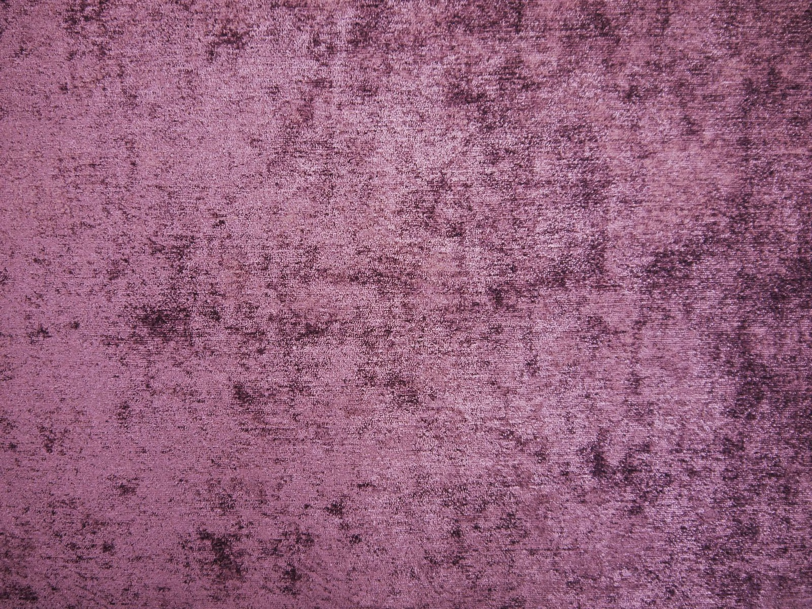 Mottled mauve-plum chenille with dark cloudy marks and a soft brushed surface