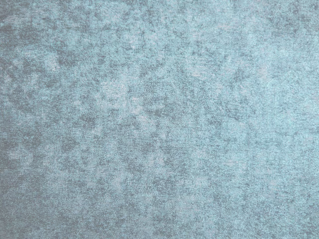 Softly mottled aqua-teal chenille with a cool, cloudy surface texture