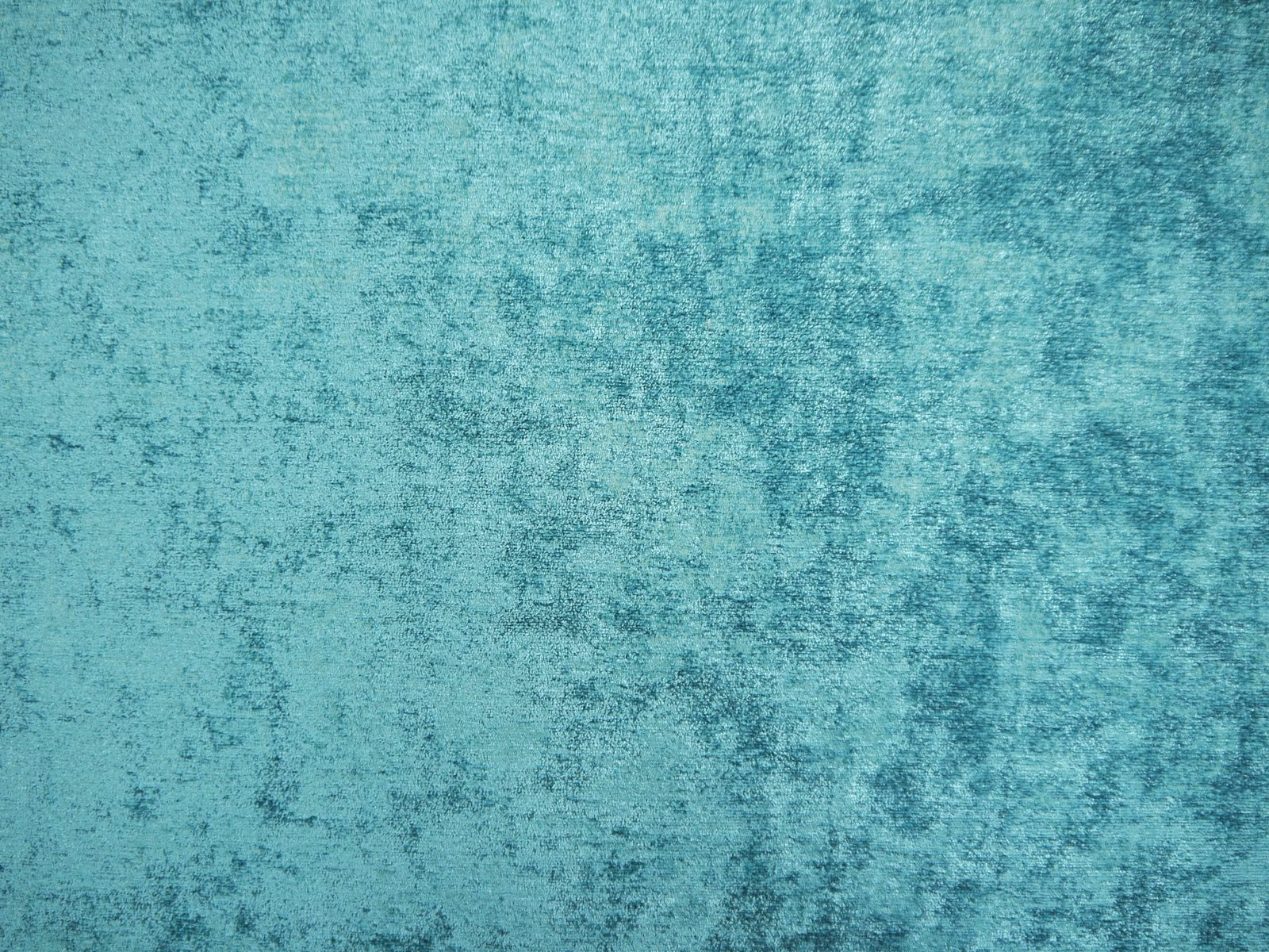 Turquoise teal chenille with a softly mottled, brushed-looking surface