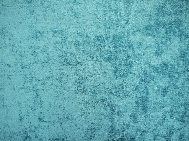 Turquoise teal chenille with a softly mottled, brushed-looking surface