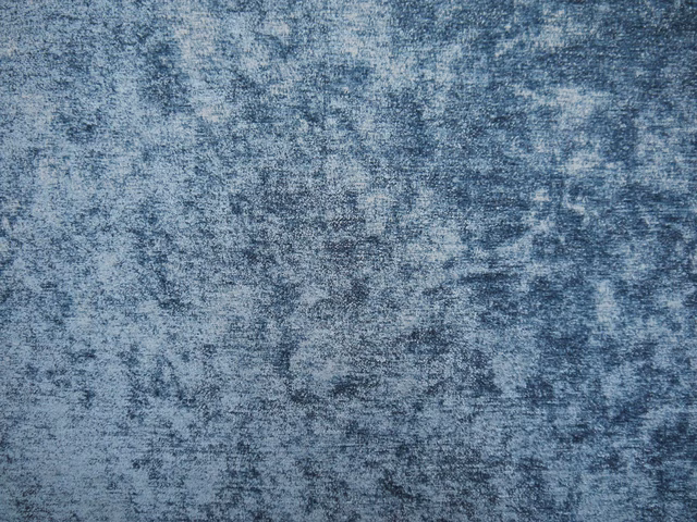 Mottled blue-grey chenille with cloudy slate flecks and softly brushed texture