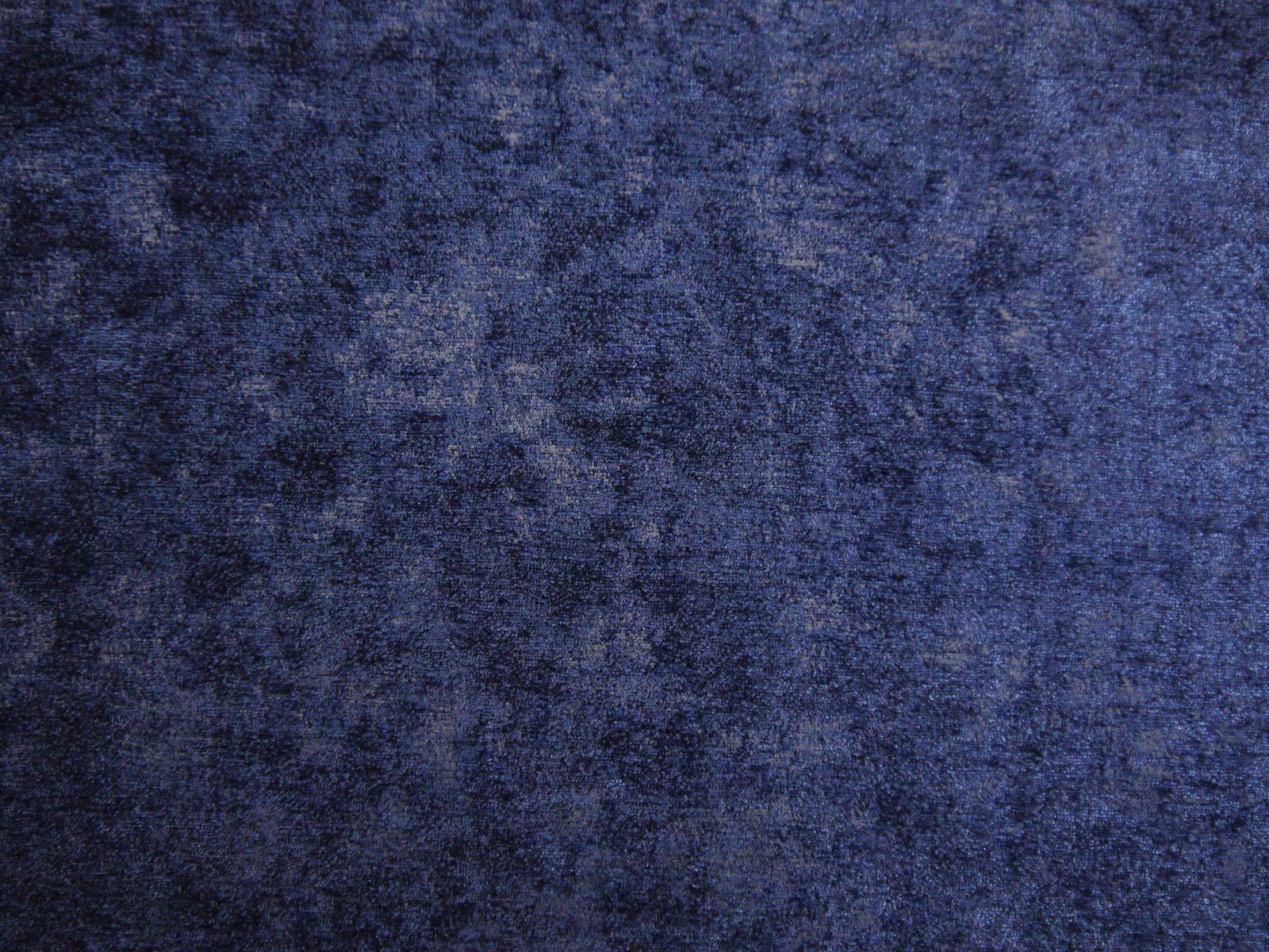 Deep indigo chenille with cloudy blue-violet mottling and softly raised texture