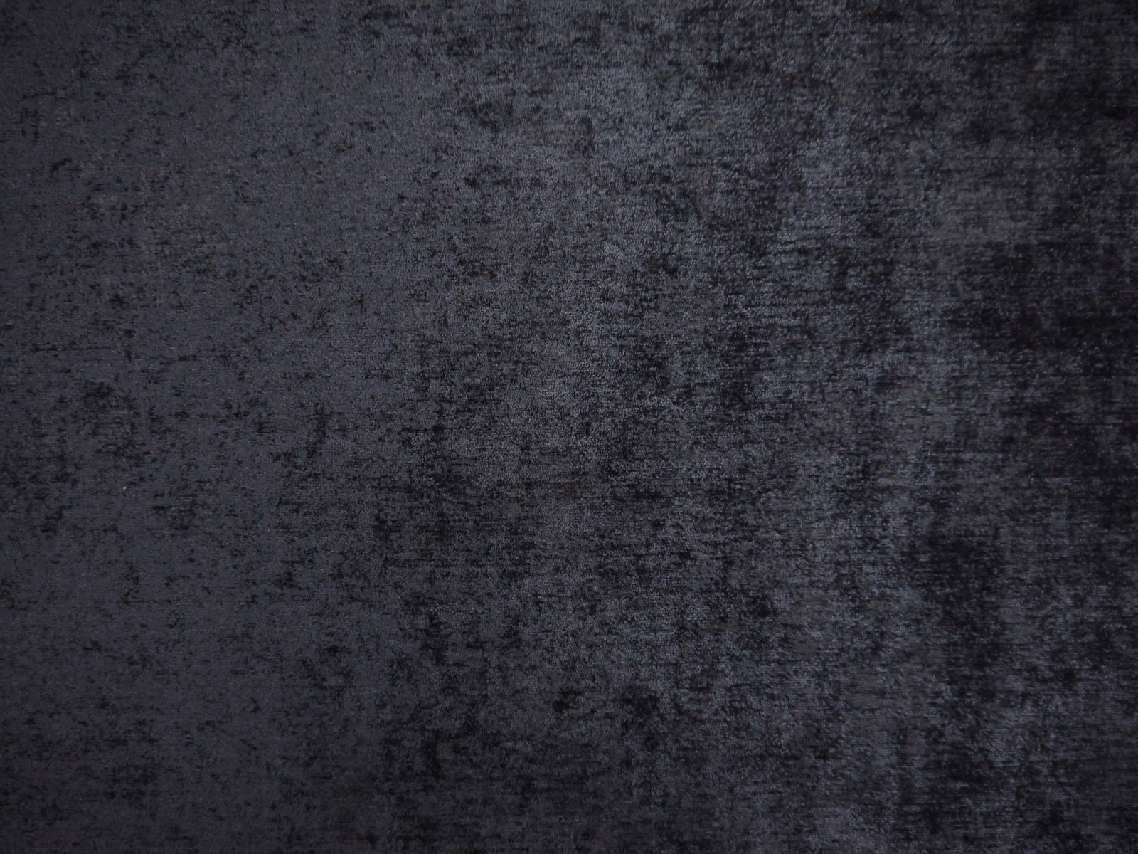 Deep charcoal grey chenille with softly mottled, shadowed surface texture