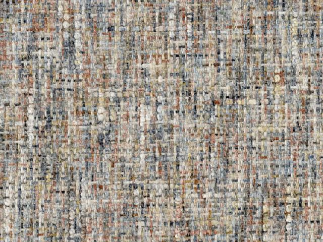 Close-up of flecked greige chenille with cream, blue-grey and rust threads