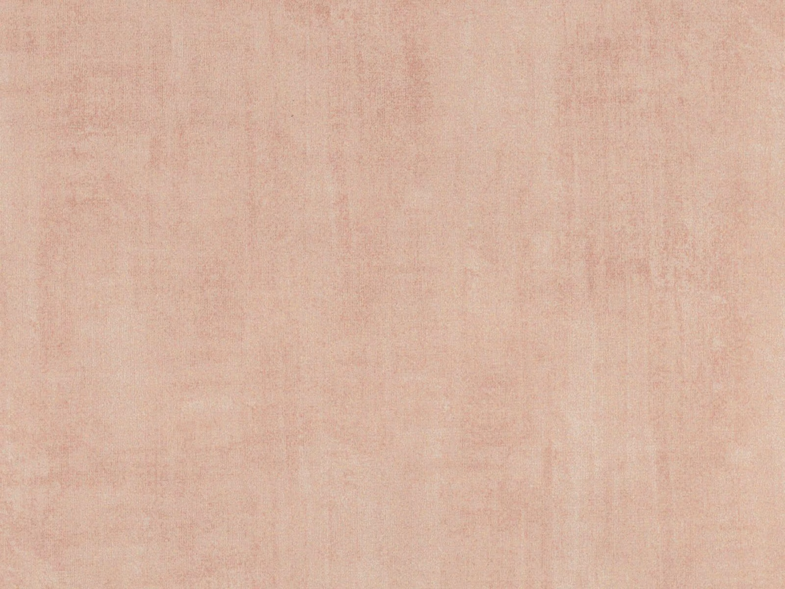 Dusty blush pink velvet with soft vertical nap and mottled tonal texture