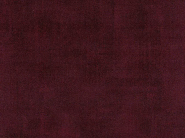 Deep burgundy velvet with subtle tonal nap and muted plum shading