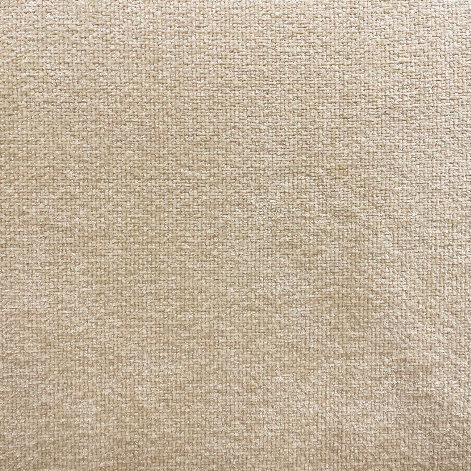 Close-up of warm oatmeal chenille with a softly mottled woven surface