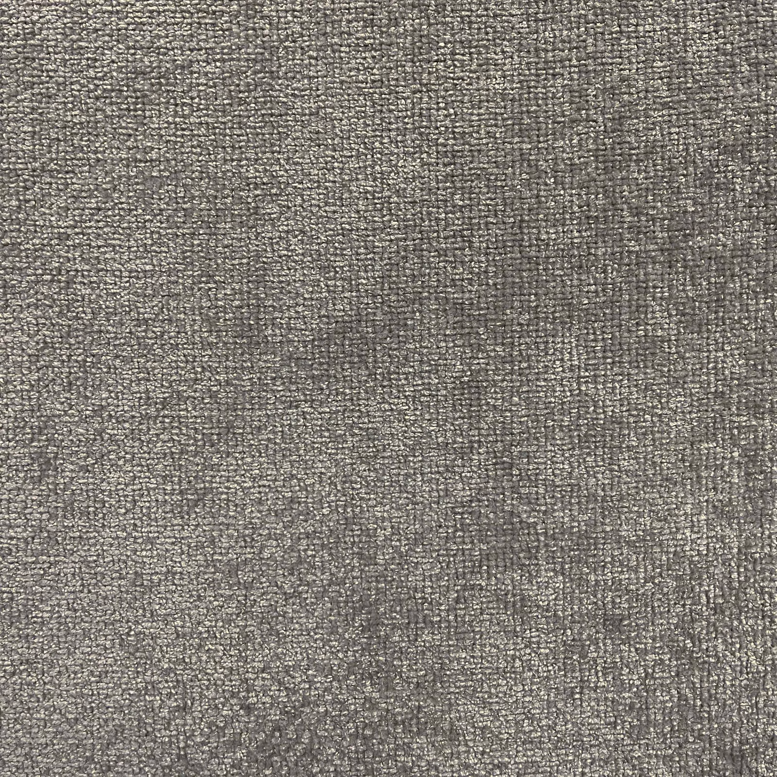 Close-up of mottled taupe-grey chenille with a dense, softly textured weave