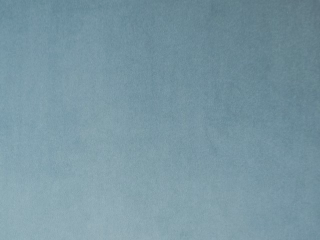 Soft aqua-blue velvet with a subtly mottled nap catching the light