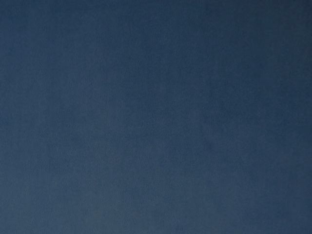 Deep petrol-blue velvet with a softly shifting, close-cut pile