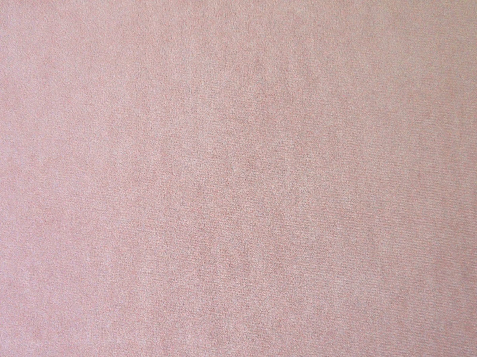 Pale blush pink plain velvet with a soft, subtly lustrous pile