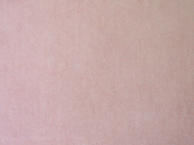 Pale blush pink plain velvet with a soft, subtly lustrous pile