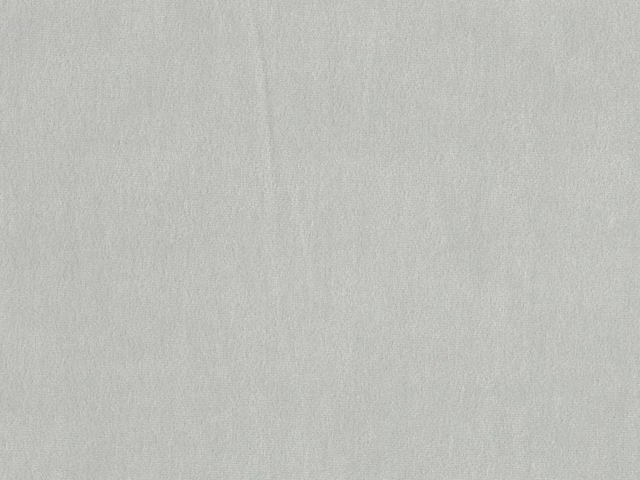 Pale cool-grey velvet swatch showing a smooth brushed nap and subtle tonal shading