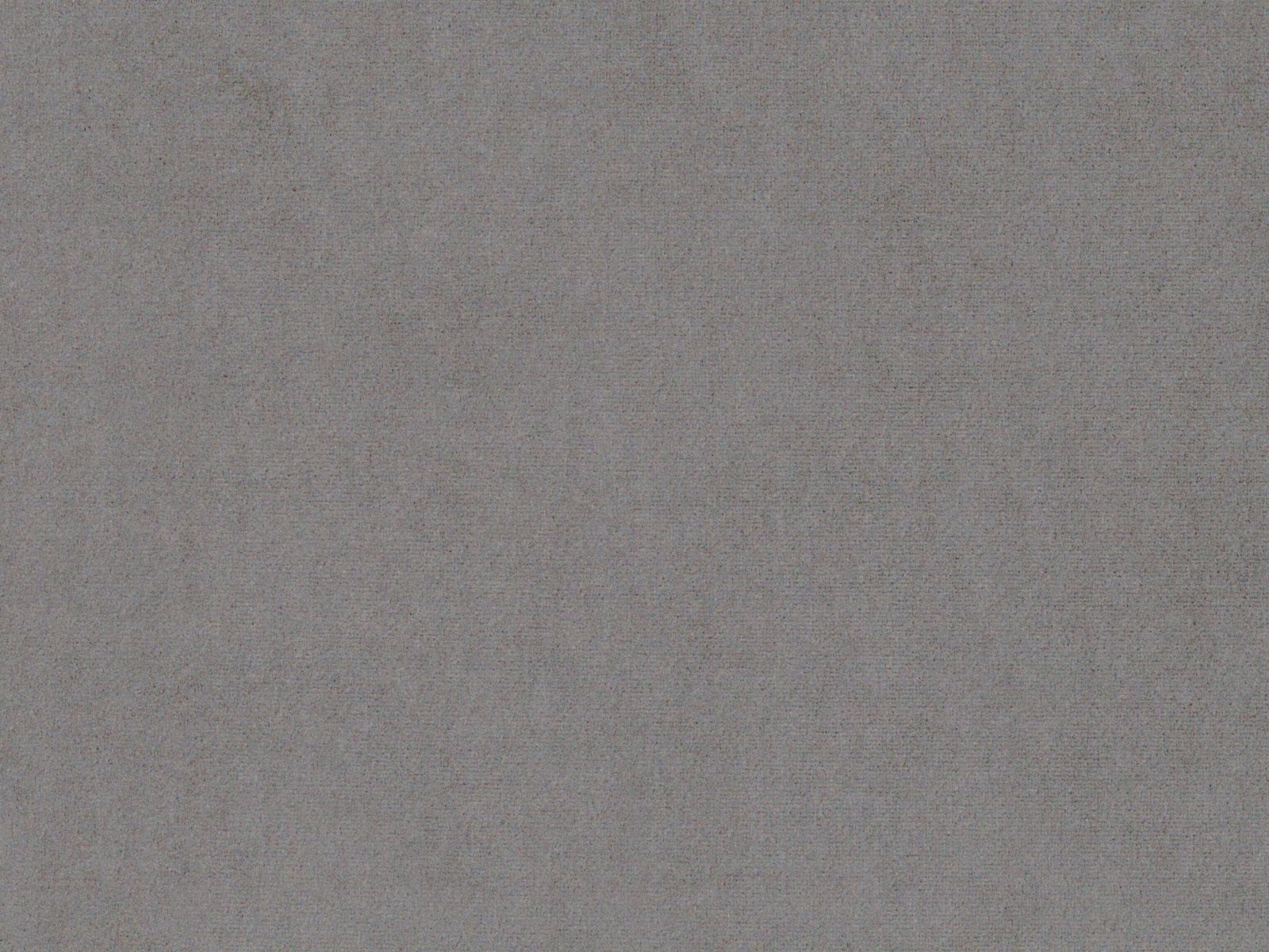 Close-up of plain warm grey-taupe velvet with a softly brushed, even nap