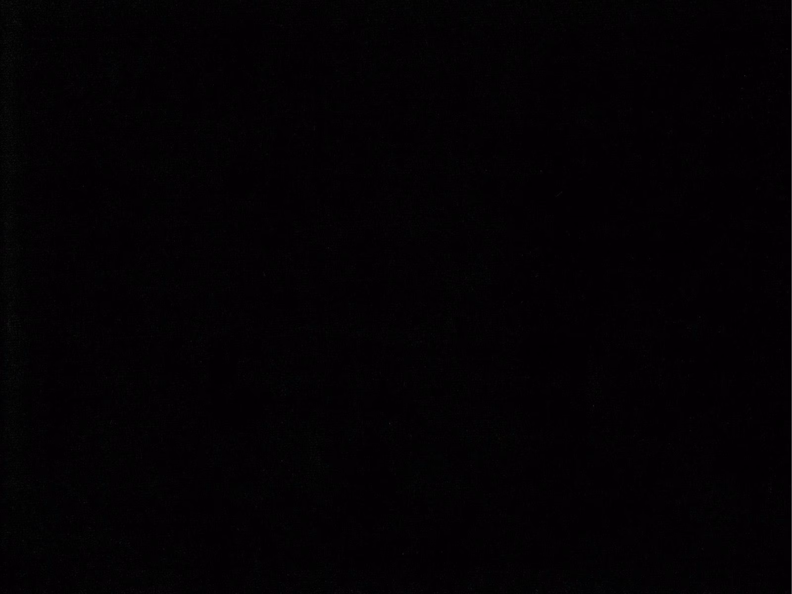 Near-black plain velvet swatch showing a subtle light-catching pile texture