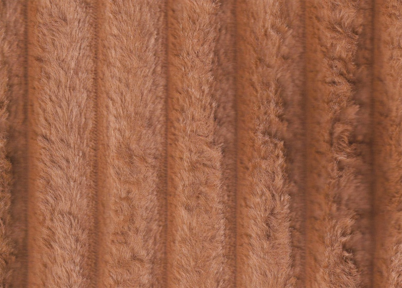 Warm russet faux fur with plush vertical bands and softly varied pile